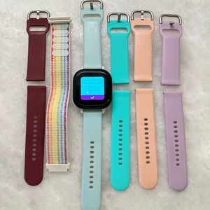Verizon Gizmo Watch with 6 bands. Model ZW20. Charger included.